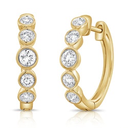 Radiant 14K Gold Diamond Huggie Earrings with 0.39 Carats