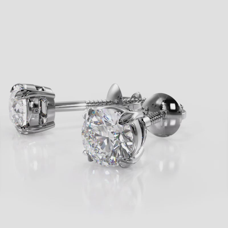Load video: Round Cut Diamond Stud Earrings