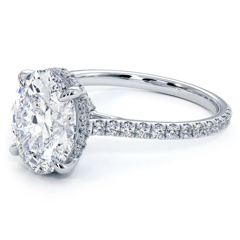 Exquisite Oval-Cut Diamond Halo Engagement Ring with Pave Diamond Band